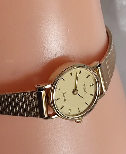 14ct golden Tissot 