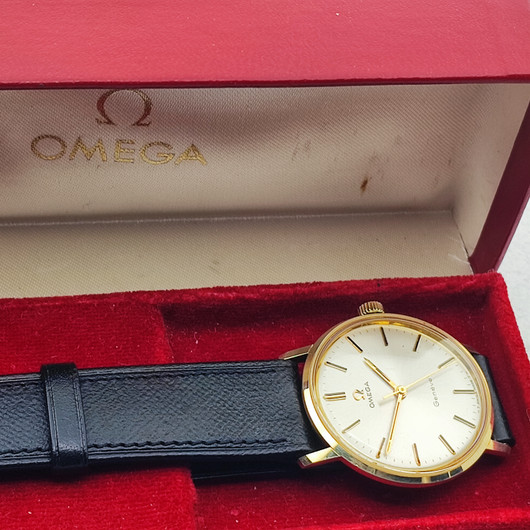 vintage solid  golden Omega Geneve . rare cal 131.050