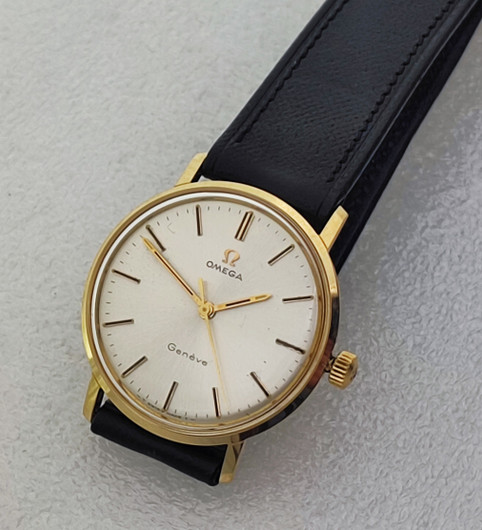 vintage solid  golden Omega Geneve . rare cal 131.050