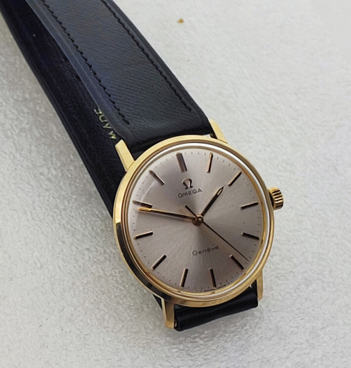 vintage solid  golden Omega Geneve . rare cal 131.050