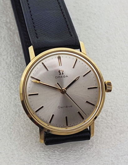 vintage solid  golden Omega Geneve . rare cal 131.050