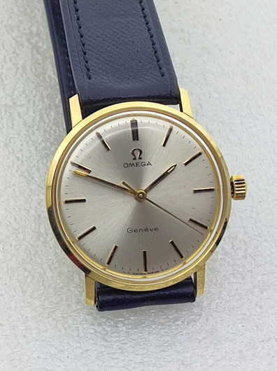 vintage solid  golden Omega Geneve . rare cal 131.050