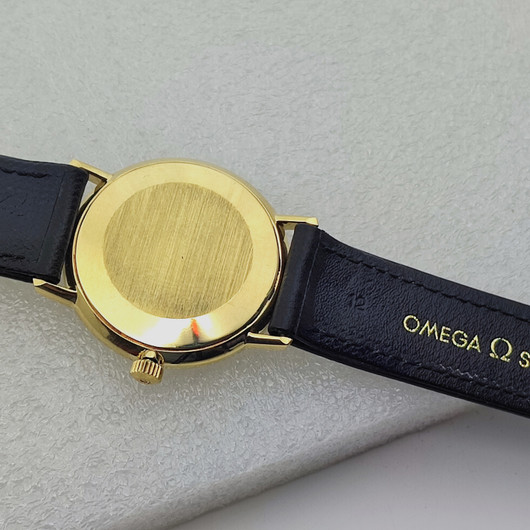 vintage solid  golden Omega Geneve . rare cal 131.050