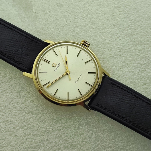 vintage solid  golden Omega Geneve . rare cal 131.050
