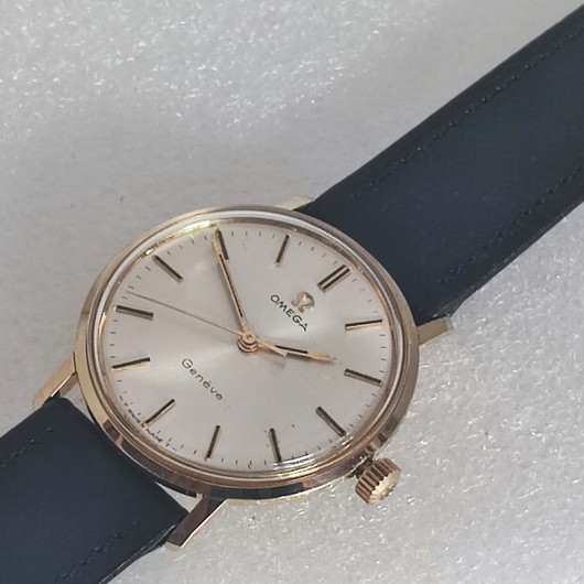 vintage solid  golden Omega Geneve . rare cal 131.050