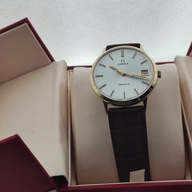 vintage solid  golden Omega Geneve 