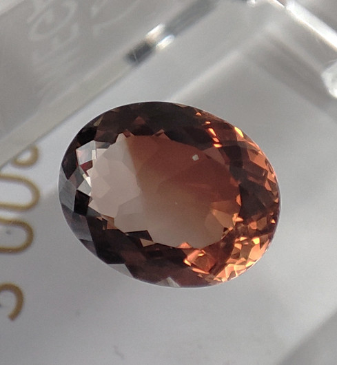 Imperial topaz 16 mm / 12,8 ct bicolor oval