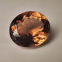 Imperial topaz 14,7 mm / 12 ct Brasiliasta kullan ruskeilla loisteilla ovaali 