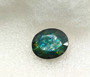 Erikoinen luonnon safiiri 18 x 15 mm / 14,5 ct  monivärinen loiste 