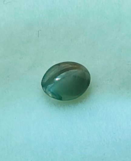 Alexandrite 4,8 x 3,8 mm / 0,3 ct oval, cat eye effect with certificate
