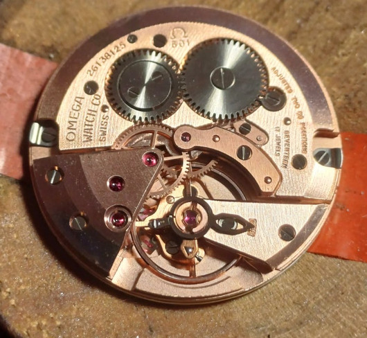 vintage solid  golden Omega Geneve . rare cal 131.050