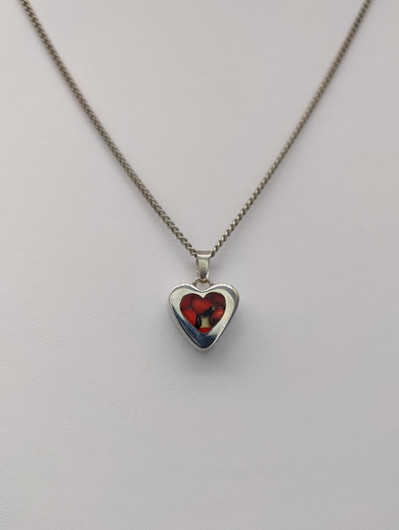 Vintage silver heart shaped pendant with chain