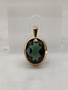 Vintage gold pendant with synthetic spinel