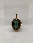 Vintage gold pendant with synthetic spinel