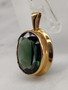 Vintage gold pendant with synthetic spinel