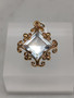 Vintage gold pendant with topaz
