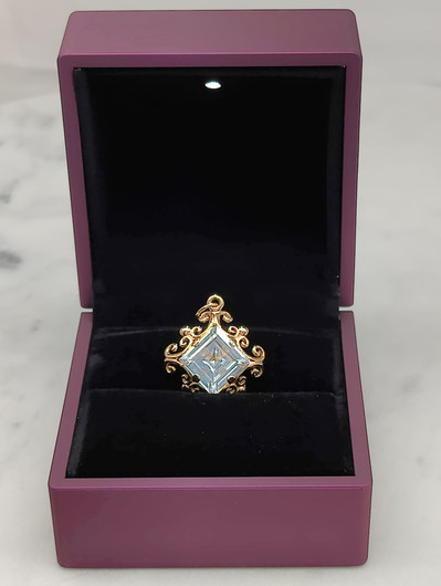 Vintage gold pendant with topaz