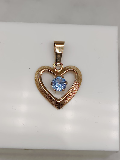 Vintage gold pendant with spinel