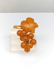 Vintage Baltic amber brooch ,like leaves and berries