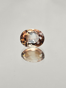 Imperial Topaasi 12 x 10 mm / 8,55 ct ovaali harvinaisuus  kuvallisella aitoustodistuksella