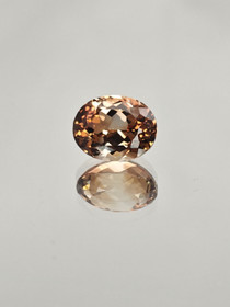 Imperial Topaasi 12 x 10 mm / 8,55 ct ovaali harvinaisuus  kuvallisella aitoustodistuksella