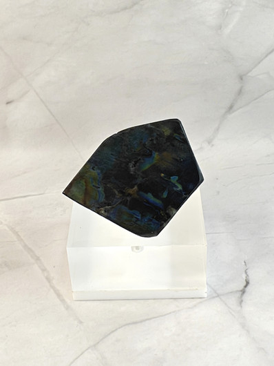 Vintage brooch with spectrolite