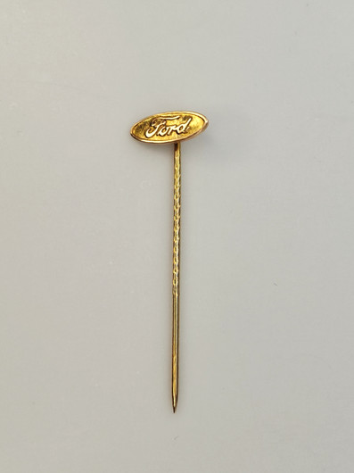 Vintage gold brooch FORD