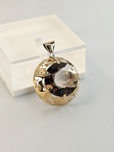 Vintage gold pendant with quartz