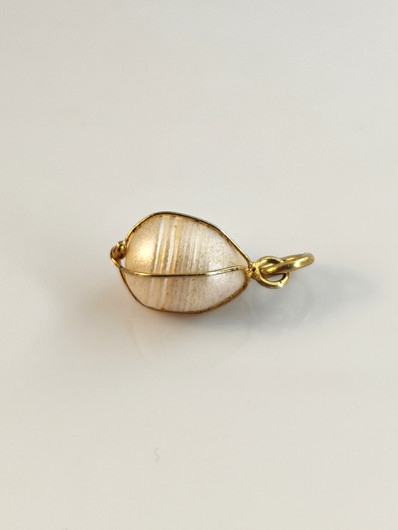 Vintage gold colored sea pearl pendant