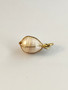 Vintage gold colored sea pearl pendant