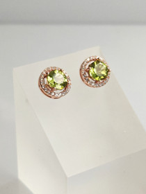 individual gold colored silver peridot earrings with decorative stones