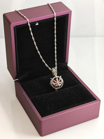 individual silver opening pendant and chain with decorative stone