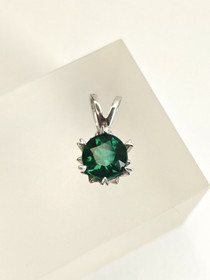 individual silver pendant with synthetic Emerald