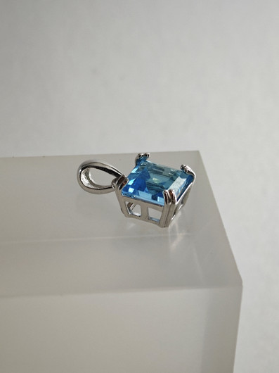 individual silver pendant with real Topaz