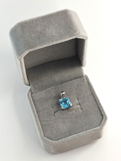 individual silver pendant with real Topaz