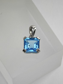 individual silver pendant with real Topaz
