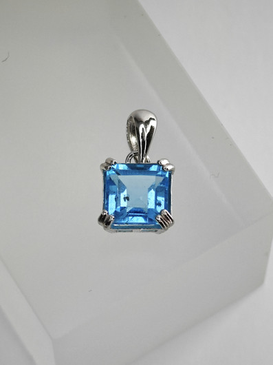 individual silver pendant with real Topaz