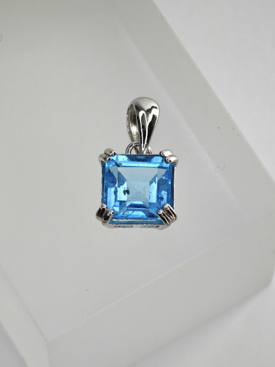 individual silver pendant with real Topaz