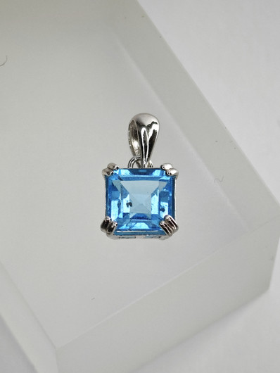 individual silver pendant with real Topaz