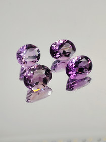 Ametisti erä ( 9 - 8 x 6 x 5 - 4 mm \ 1,8 ct ) ovaali