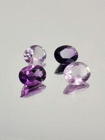Ametisti erä ( 8 x 7 - 6 x 4 - 3 mm \ 1,4 ct ) ovaali