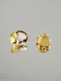 Citrine pair 9 x 8 - 7 x 5 mm \ 2 x 2,5 ct oval