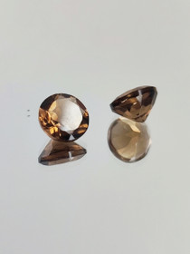Smokey Quartz pair ( 6 x 4 mm \ 1,1 ct ) round