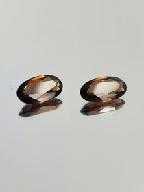 Smokey Quartz pair ( 11 x 6 - 5 x 3 mm \ 1,3 ct ) oval