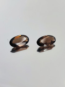 Smokey Quartz pair ( 11 x 6 - 5 x 3 mm \ 1,3 ct ) oval