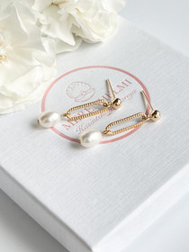 Thea korvakorut makeanveden helmillä