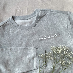 Silityskuva teksti: Mama, sirompi valkoinen