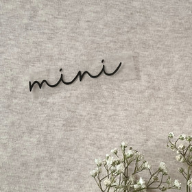 Silityskuva teksti: Mini, sirompi musta