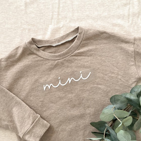 Silityskuva teksti: Mini, isompi