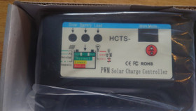 Aurinkosähköjärjestelmän lataussäädin / akkulaturi (controller) 20A, 12V tai 24V, käyttämätön